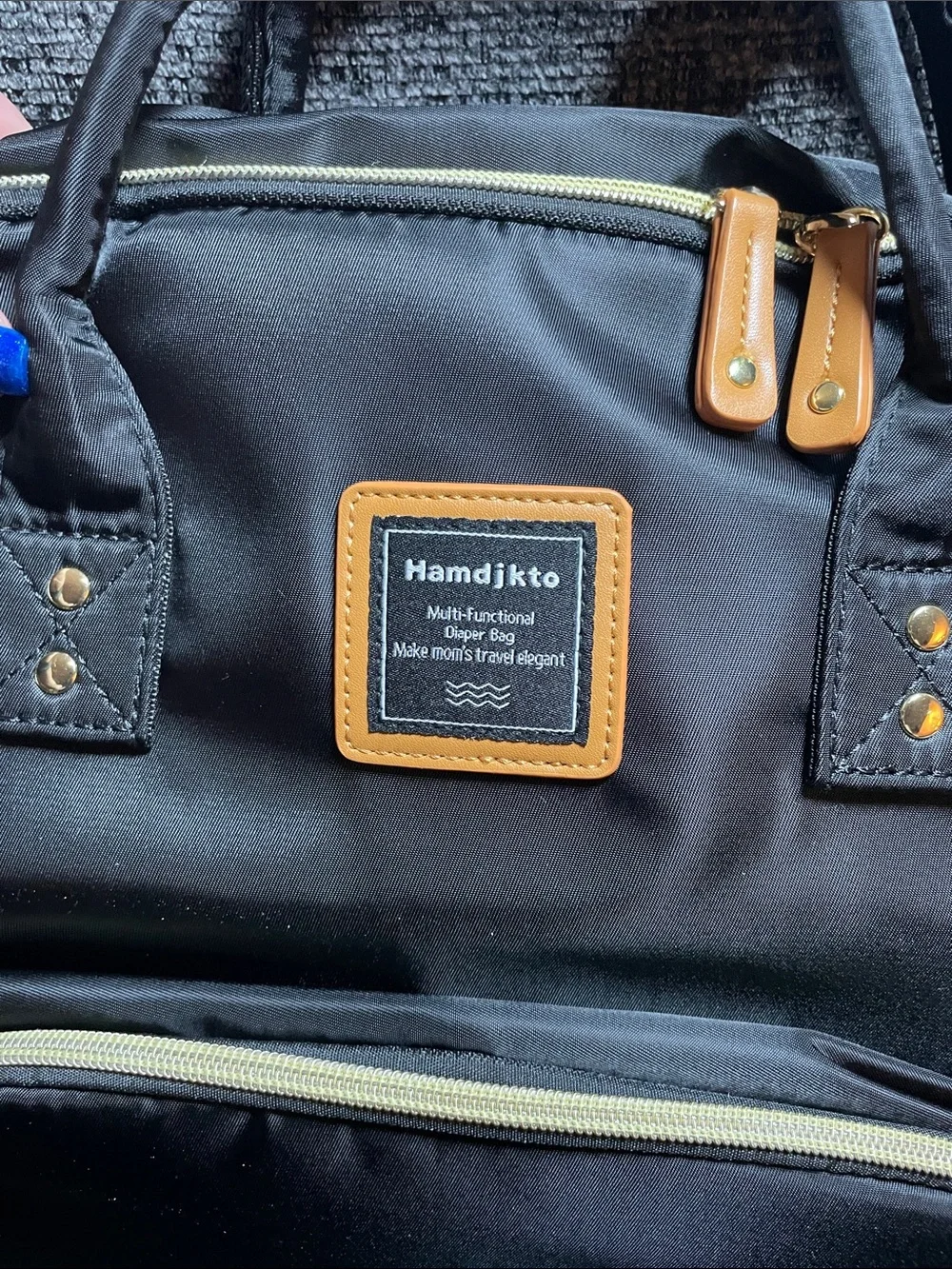 Classic Black Baby Bag Backpack with Tan Accents